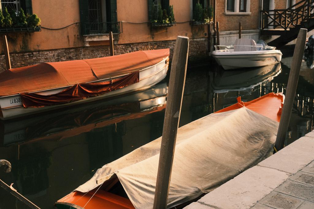 Sun set on orange boats and orange houses